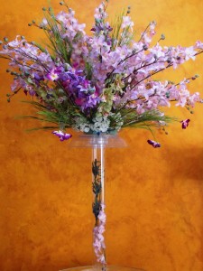 LAVENDER ORCHID CENTERPIECE ON CLEAR STAND