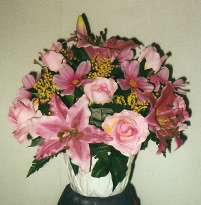 Mother's day arrangement of pink day lily and dailsy and roses