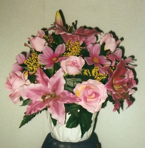 Mother's day arrangement of pink day lily and dailsy and roses 